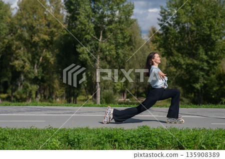 Caucasian woman roller skating in park. Caucasian woman roller skating in park. 135908389