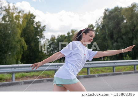 Caucasian woman in shorts roller skating. Caucasian woman in shorts roller skating. 135908399