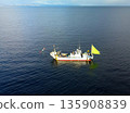 Aerial view of fishing boats fishing in Yakumo Town, Hokkaido in winter 135908839