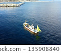 Aerial view of fishing boats fishing in Yakumo Town, Hokkaido in winter 135908840