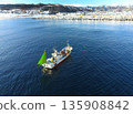 Aerial view of fishing boats fishing in Yakumo Town, Hokkaido in winter 135908842