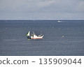 Photographing a fishing boat operating off the coast of Yakumo Town, Hokkaido in winter 135909044