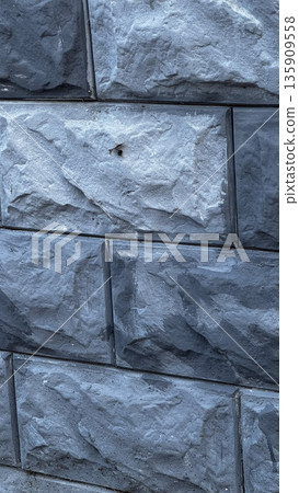 Textured Gray Stone Wall for Modern Design Projects 135909558
