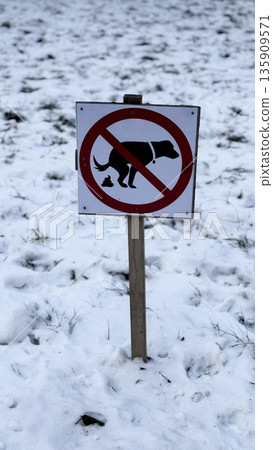 No Dog Pooping Sign in Snowy Landscape No Dog Pooping Sign in Snowy Landscape 135909571