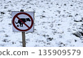 No Dogs Allowed Sign in Snowy Landscape for Pet Owners 135909579