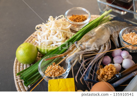Pad Thai has a main ingredient such as noodle, shrimp, garlic chives, yellow tofu, chilli powder, shallot, fish sauce, palm sugar,and much more. Pad Thai has a main ingredient such as noodle, shrimp, garlic chives, yellow tofu, chilli powder, shallot, fish sauce, palm sugar,and much more. 135910541