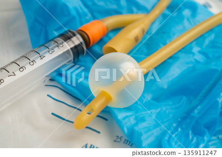 Foley catheter and urine drainage bag collect urine for disability or patient in hospital. Foley catheter and urine drainage bag collect urine for disability or patient in hospital. 135911247