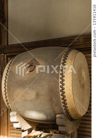 Japan: The large drum at Buttsuji Temple in Takasaki-cho, Mihara City, Hiroshima Prefecture Japan: The large drum at Buttsuji Temple in Takasaki-cho, Mihara City, Hiroshima Prefecture 135911416
