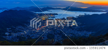 Night view of Kure city and the Seto Inland Sea from the Haigamine Observatory in Tochihara-cho, Kure City, Hiroshima Prefecture, Japan Night view of Kure city and the Seto Inland Sea from the Haigamine Observatory in Tochihara-cho, Kure City, Hiroshima Prefecture, Japan 135911474