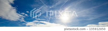 Blue sky with clouds. Cloudy sky background. Horizontal banner Blue sky with clouds. Cloudy sky background. Horizontal banner 135912850
