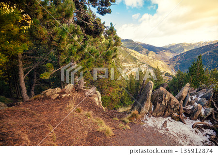 Mountain landscape in autumn. View from mountain of ridge on a sunny day, Pyrenees, Andorra Mountain landscape in autumn. View from mountain of ridge on a sunny day, Pyrenees, Andorra 135912874
