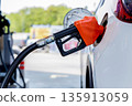Refill and filling Oil Gas Fuel at station. Gas station - refueling.  135913059