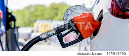 Refill and filling Oil Gas Fuel at station. Gas station - refueling. Refill and filling Oil Gas Fuel at station. Gas station - refueling. 135913060