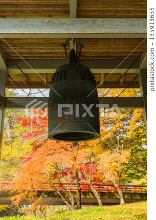 Japan, Taishaku Gorge in Tojo-cho, Shobara City, Hiroshima Prefecture, Japan. The bell tower and autumn leaves near Sainokawara in Kami-Taishaku. Japan, Taishaku Gorge in Tojo-cho, Shobara City, Hiroshima Prefecture, Japan. The bell tower and autumn leaves near Sainokawara in Kami-Taishaku. 135913635