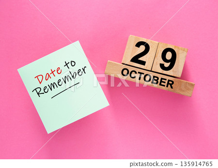 Date October 29 to remember concept with sticky note and wooden calendar Date October 29 to remember concept with sticky note and wooden calendar 135914765