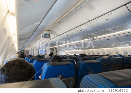 Airplane cabin seat economy 135914852