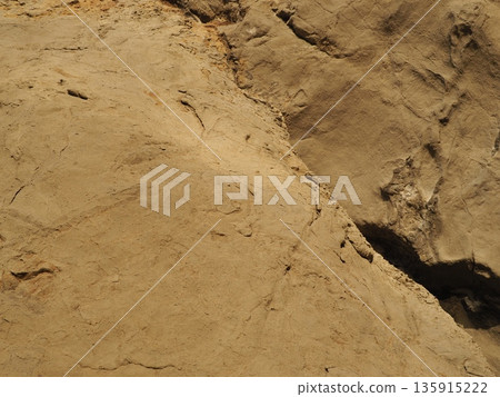 Texture: Sand and rock art. Natural art that transcends time and space. Copy space. Texture: Sand and rock art. Natural art that transcends time and space. Copy space. 135915222