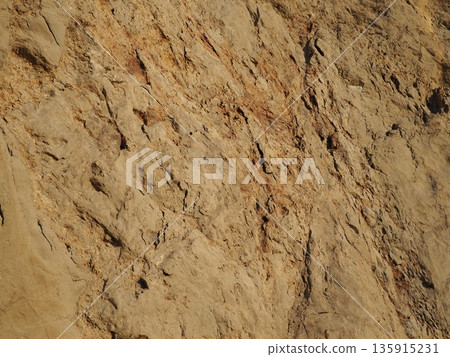 Texture: Sand and rock art. Natural art that transcends time and space. Copy space. Texture: Sand and rock art. Natural art that transcends time and space. Copy space. 135915231