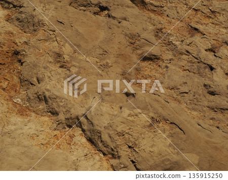 Texture: Sand and rock art. Natural art that transcends time and space. Copy space. Texture: Sand and rock art. Natural art that transcends time and space. Copy space. 135915250