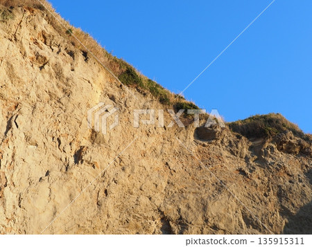 Texture: Sand and rock art. Natural art that transcends time and space. Copy space. Texture: Sand and rock art. Natural art that transcends time and space. Copy space. 135915311
