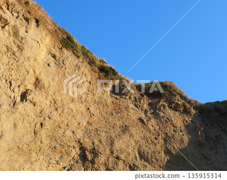 Texture: Sand and rock art. Natural art that transcends time and space. Copy space. Texture: Sand and rock art. Natural art that transcends time and space. Copy space. 135915314