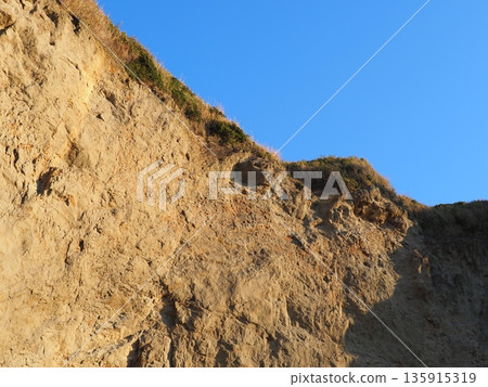 Texture: Sand and rock art. Natural art that transcends time and space. Copy space. Texture: Sand and rock art. Natural art that transcends time and space. Copy space. 135915319