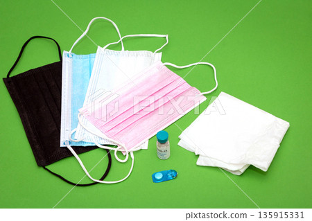 Battling coronavirus with vaccine vial and face masks Battling coronavirus with vaccine vial and face masks 135915331