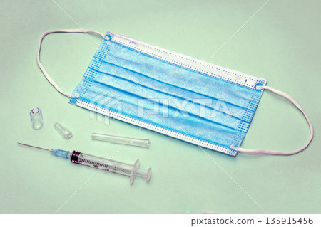 Open cracked vial with injection needle Open cracked vial with injection needle 135915456