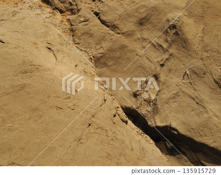 Dry Earth Texture - Stone and Sand Art - Artwork Found on the Coast - Copy Space of the Sea and Coast 135915729