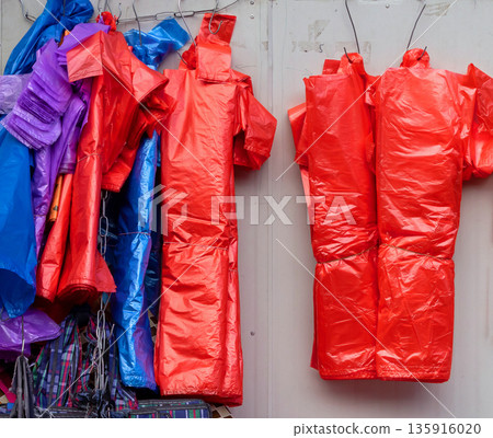 Plastic colorful bags on market 135916020