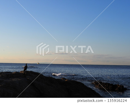 Rock and sand art. Enjoy the seascape. Copy space. An artistic background woven by nature. Rock and sand art. Enjoy the seascape. Copy space. An artistic background woven by nature. 135916224