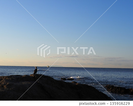 Rock and sand art. Enjoy the seascape. Copy space. An artistic background woven by nature. Rock and sand art. Enjoy the seascape. Copy space. An artistic background woven by nature. 135916229