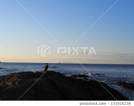Rock and sand art. Enjoy the seascape. Copy space. An artistic background woven by nature. Rock and sand art. Enjoy the seascape. Copy space. An artistic background woven by nature. 135916236