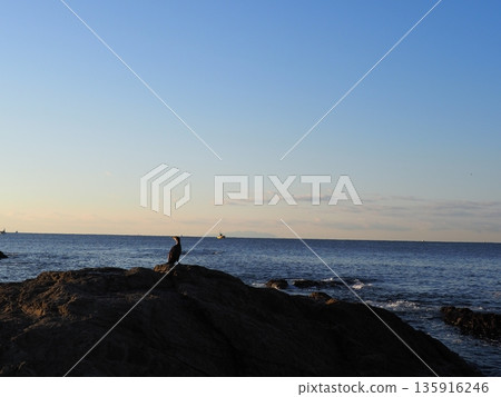 Rock and sand art. Enjoy the seascape. Copy space. An artistic background woven by nature. Rock and sand art. Enjoy the seascape. Copy space. An artistic background woven by nature. 135916246