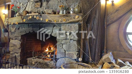 A fireplace on the grounds of the Green Dragon in Hobbiton [Matamata, New Zealand] 135916280