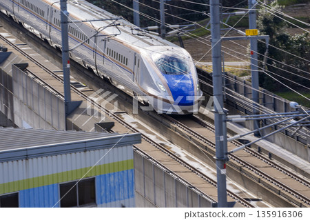 Running Hokuriku Shinkansen 135916306