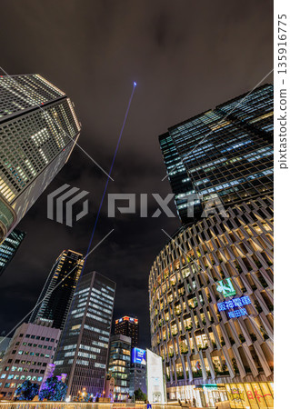 Light trails and skyscrapers piercing Umeda at night 135916775