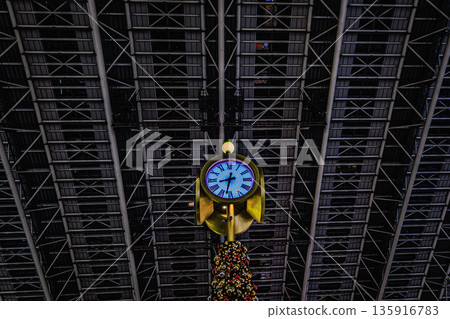 The large clock and Christmas tree that light up Osaka Station at night The large clock and Christmas tree that light up Osaka Station at night 135916783