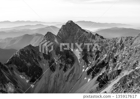 View of Maehotakadake and the north ridge from the summit of Kitahotakadake. Climbing Kitahotakadake in the Northern Alps (for newspapers and magazines) View of Maehotakadake and the north ridge from the summit of Kitahotakadake. Climbing Kitahotakadake in the Northern Alps (for newspapers and magazines) 135917617