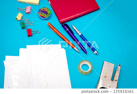Business stationery details on blue background Business stationery details on blue background 135918161