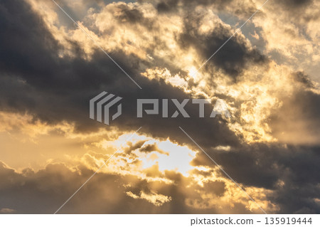 A cloud that stains in the sunset A cloud that stains in the sunset 135919444