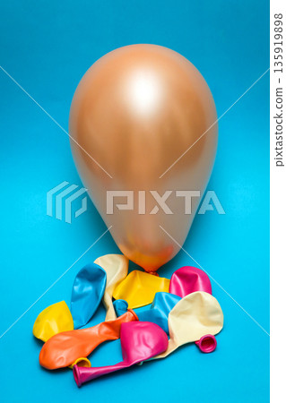 Colorful balloons on blue background Colorful balloons on blue background 135919898