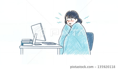 A female employee shivers because the air conditioning in the office is too strong 135920118