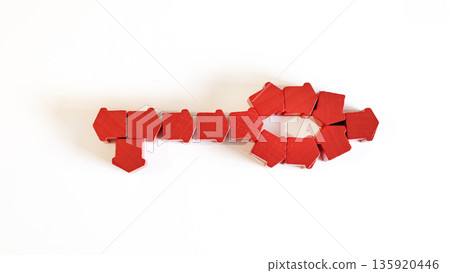 red key with figure of houses. Real estate investing and property red key with figure of houses. Real estate investing and property 135920446