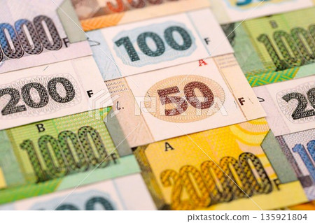 Congolese franc money bills in big amount on table close up. Rich life concept in Democratic Republic of Congo. Business and economy 135921804