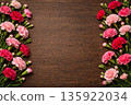 Wood grain table and carnation decoration background 135922034