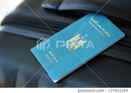 Egyptian passport on travel luggage close up. The concept of travel and vacation 135922264