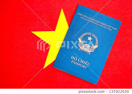 Vietnamese passport on flag close up. The concept of citizenship 135922630
