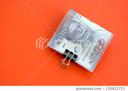Nigerian naira money bills in big amount close up. Finance and banking concept Nigerian naira money bills in big amount close up. Finance and banking concept 135922725