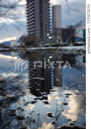 Snow-covered city buildings Snow-covered city buildings 135923050